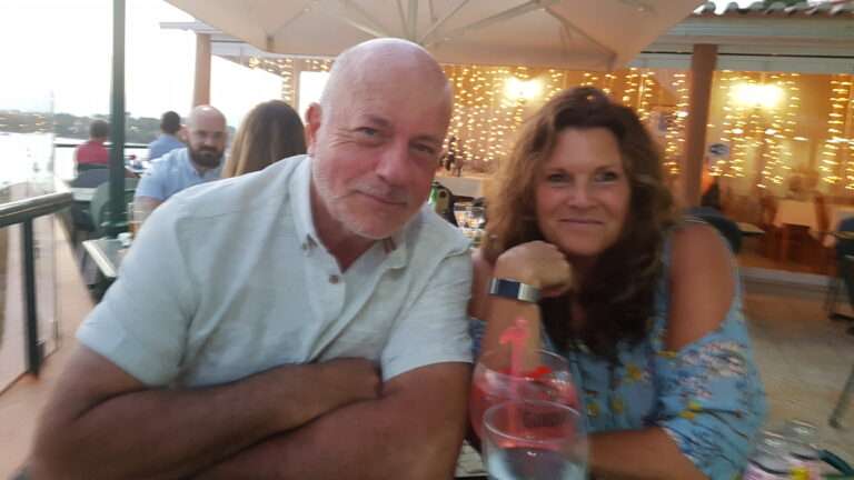 Alison and her husband on holiday
