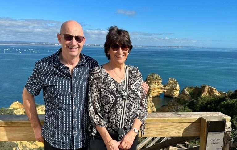 Picture of John who survived an ischaemic stroke at 58 and his wife enjoying time together