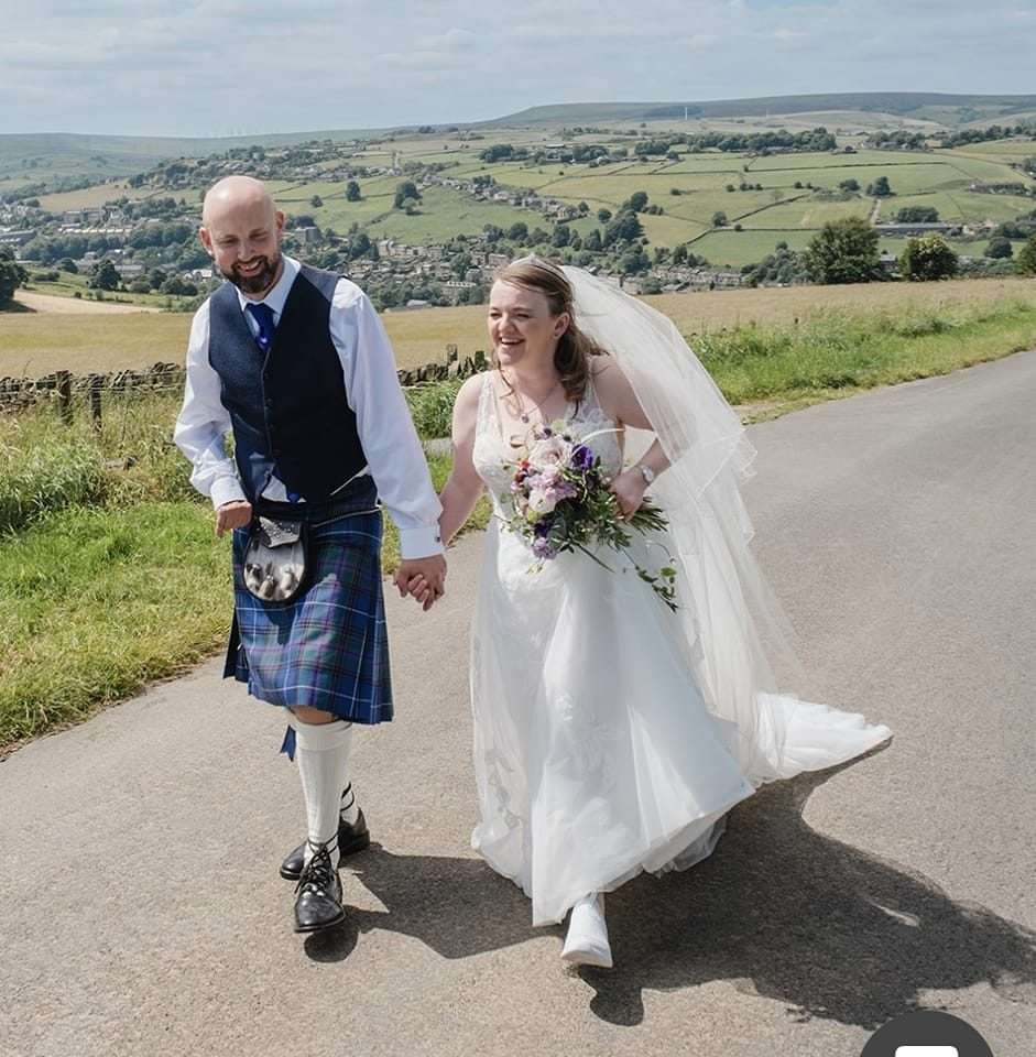Picture of Jeremy and his wife years after he survived a haemorrhagic stroke at just four years old causing right sided hemiplegia and aphasia